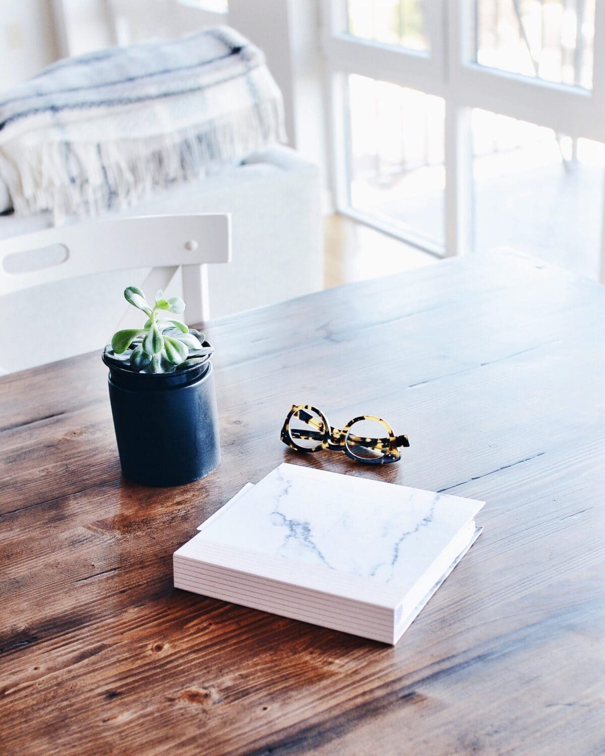 Chic Modern Home Office Setup White Table Marble Notebook Plant And Glasses Discover The Perfect Workspace